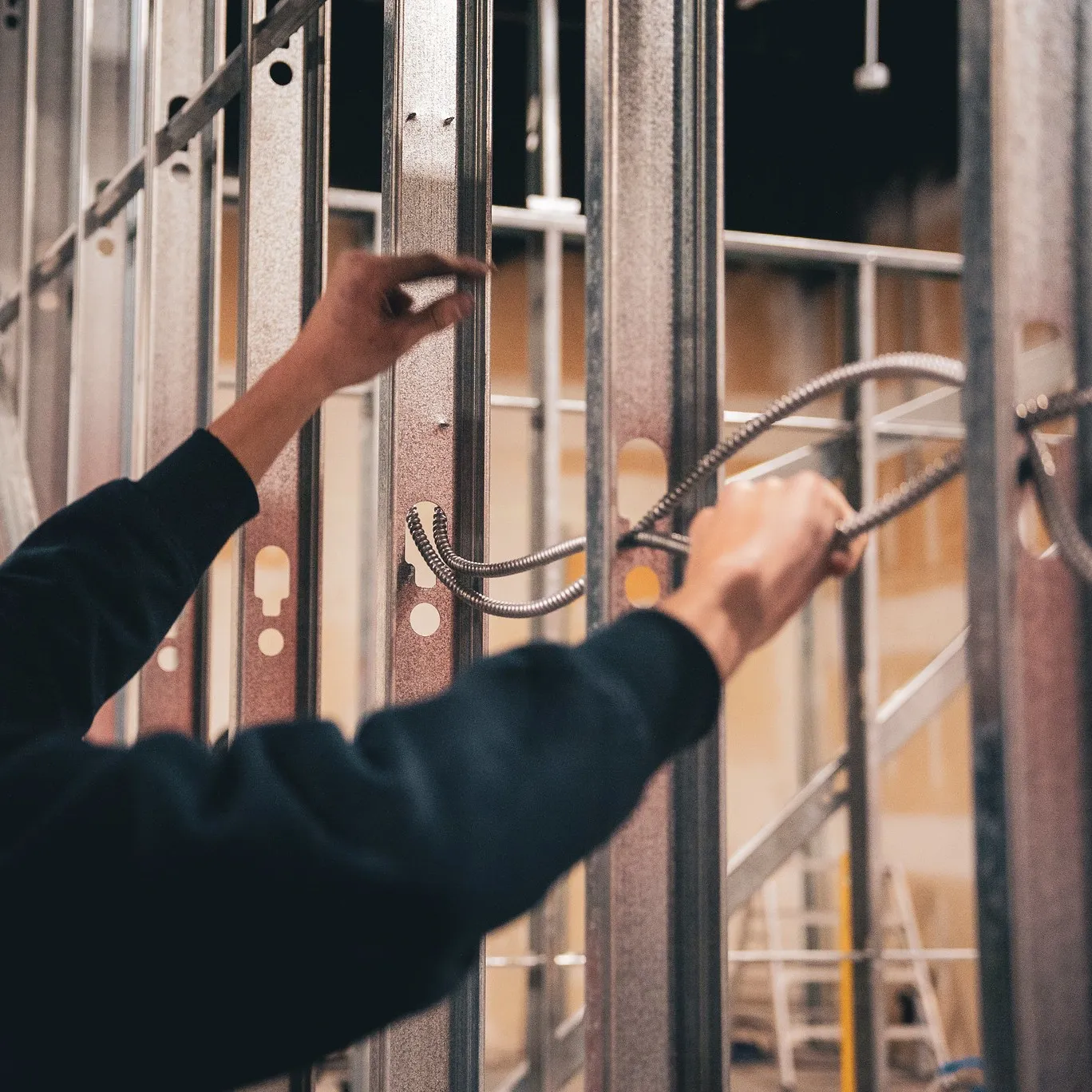 Electrical contractors on a commercial job site